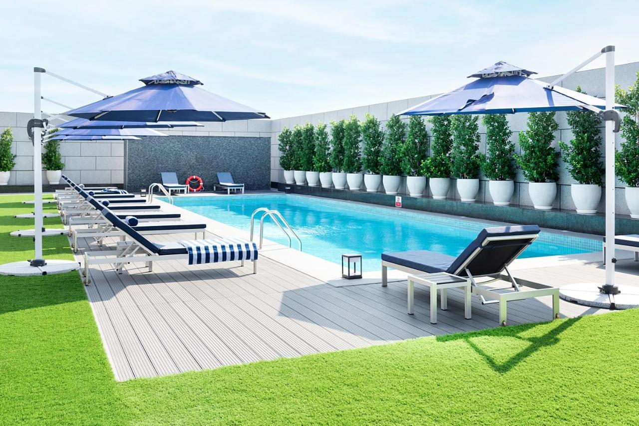 Asiana Grand Hotel Dubai Exterior photo The swimming pool at the hotel
